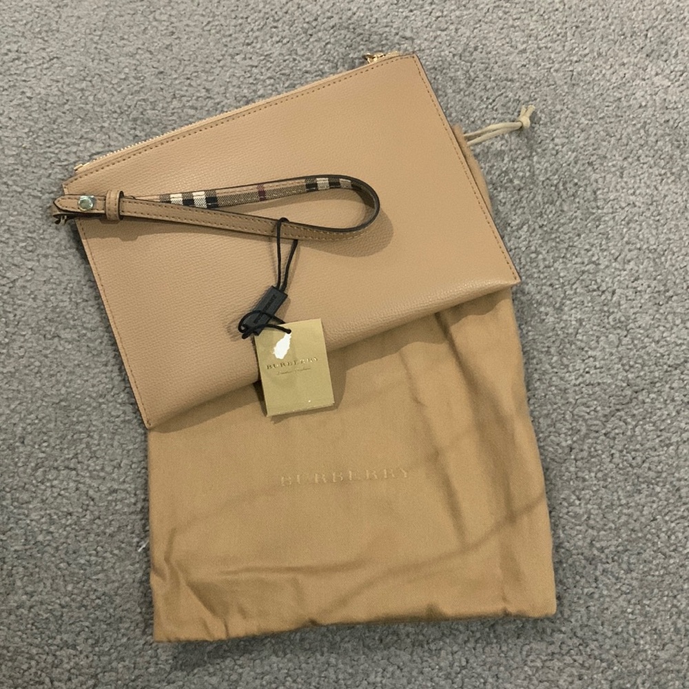 Beige burberry haymarket wristlet
